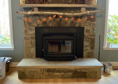 pellet fireplace insert with stone surround