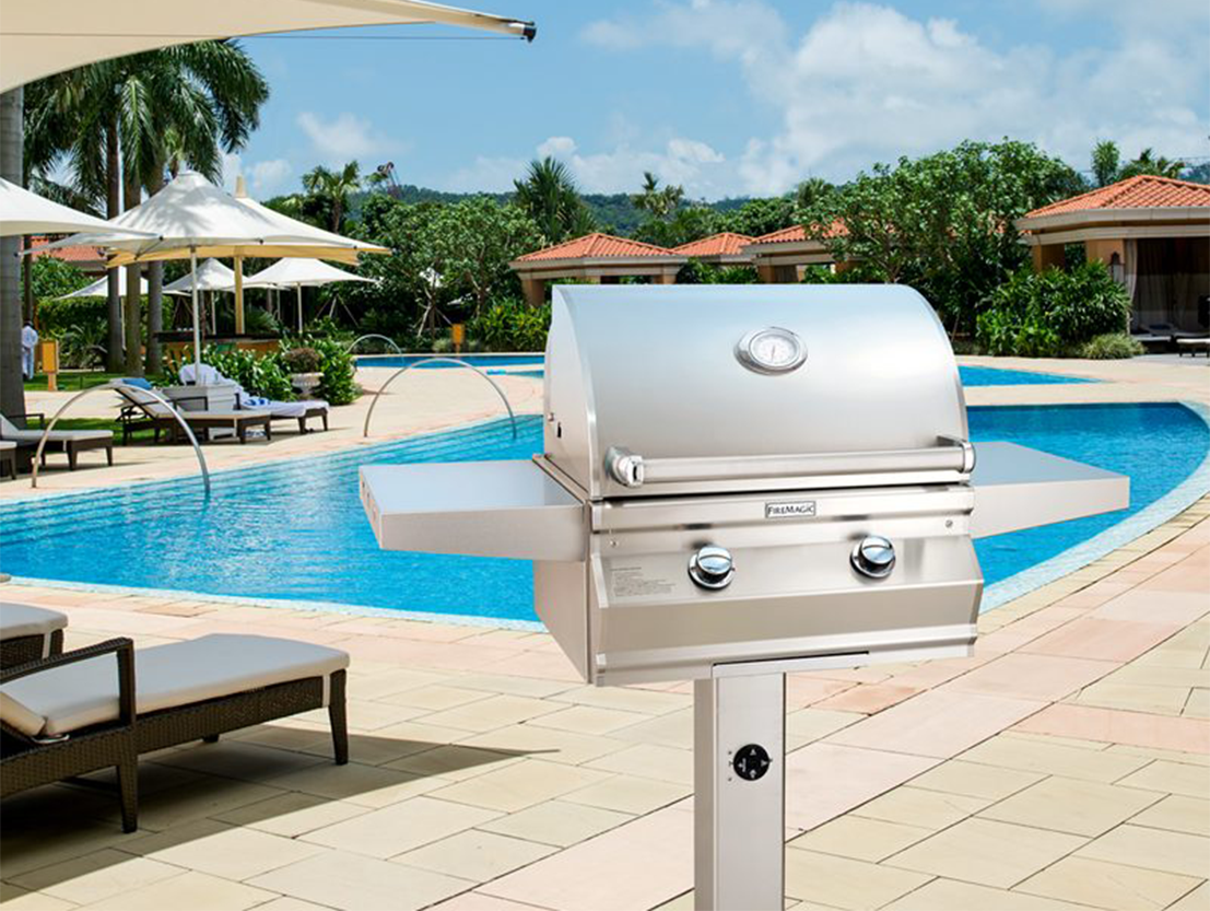 freestanding grill on the poolside deck